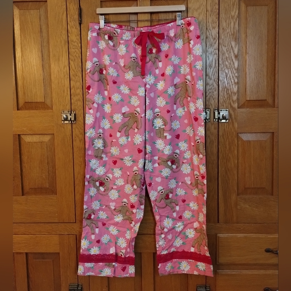 Nick & Nora pink sock monkey and daisy print flannel pajama pants